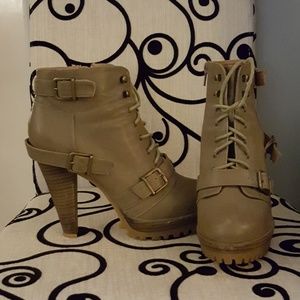 Tan lace up lug sole booties with heel